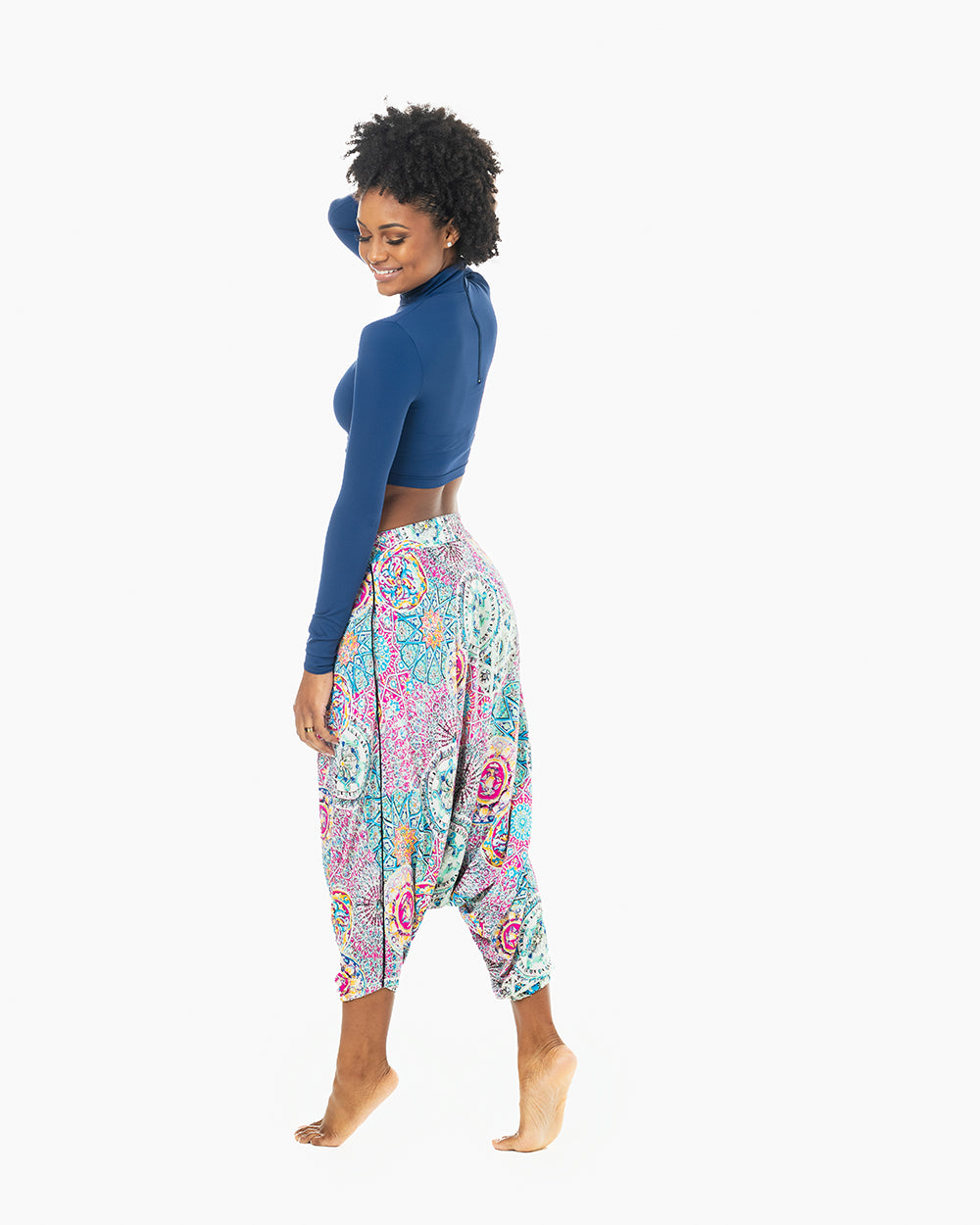 Studio photo of purple galactic harem pants with blue top #color_purple galactic