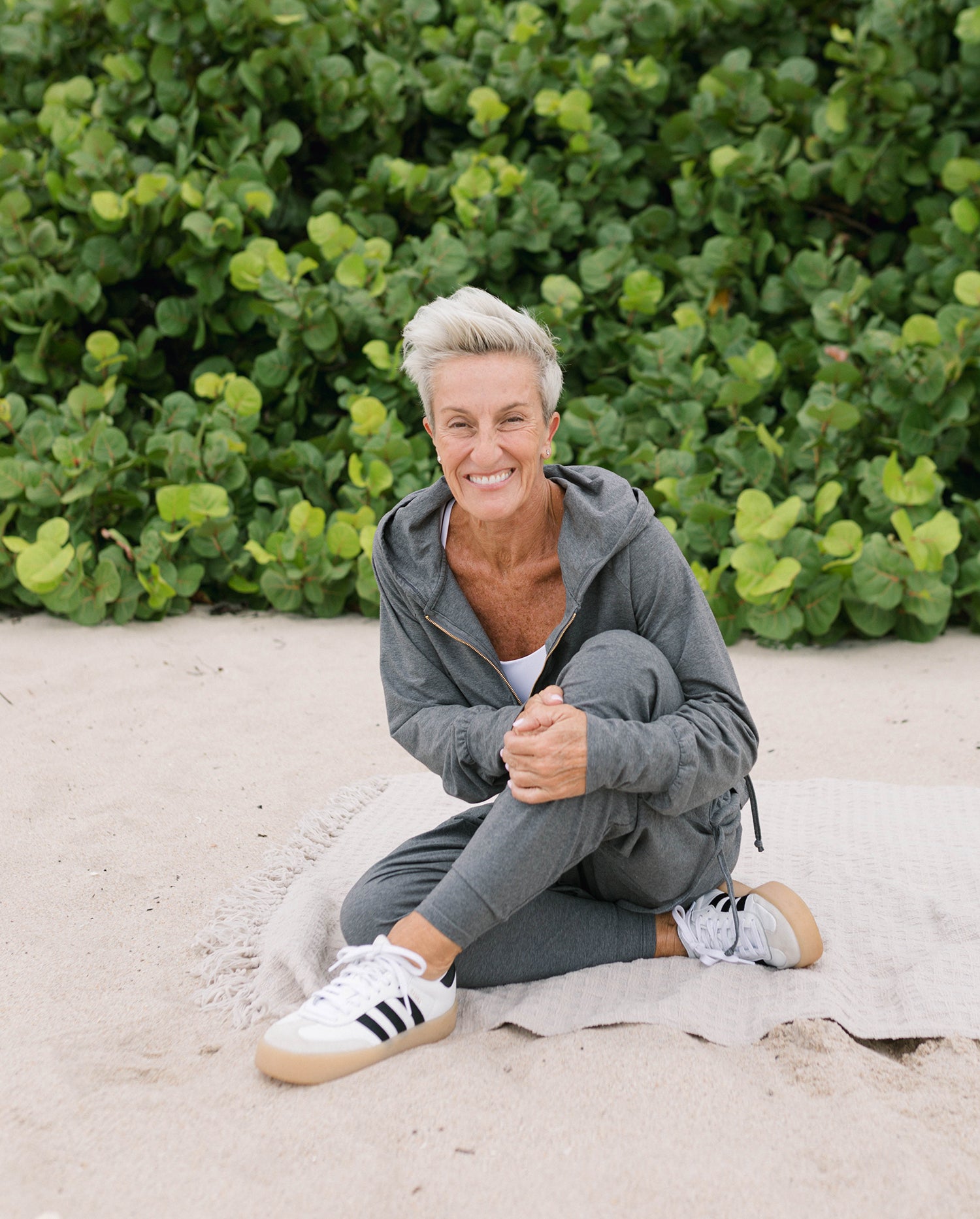 Casual sporty outfit: woman in yoga pants and hoodie #color_grey