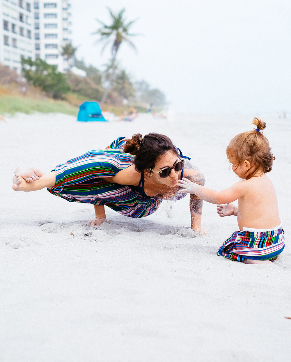 Kids matching pants on beach #color_blue stripes