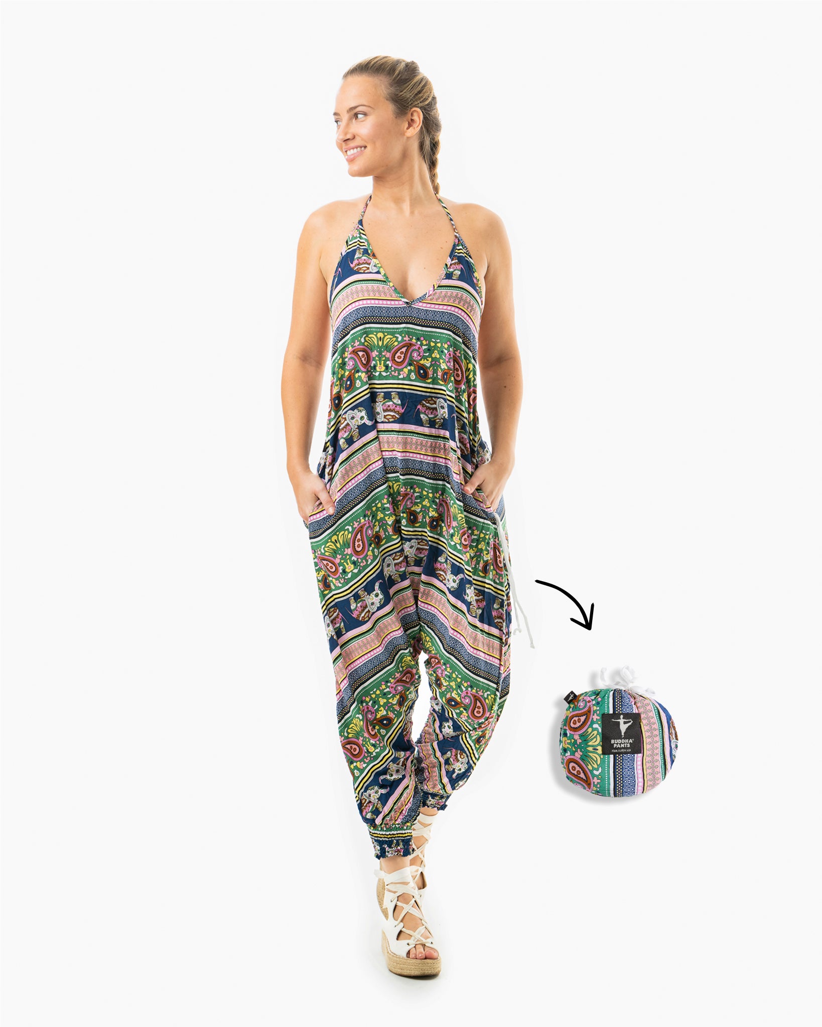 Model posing in cotton halter harem jumpsuit with elephant print #color_pink elephant