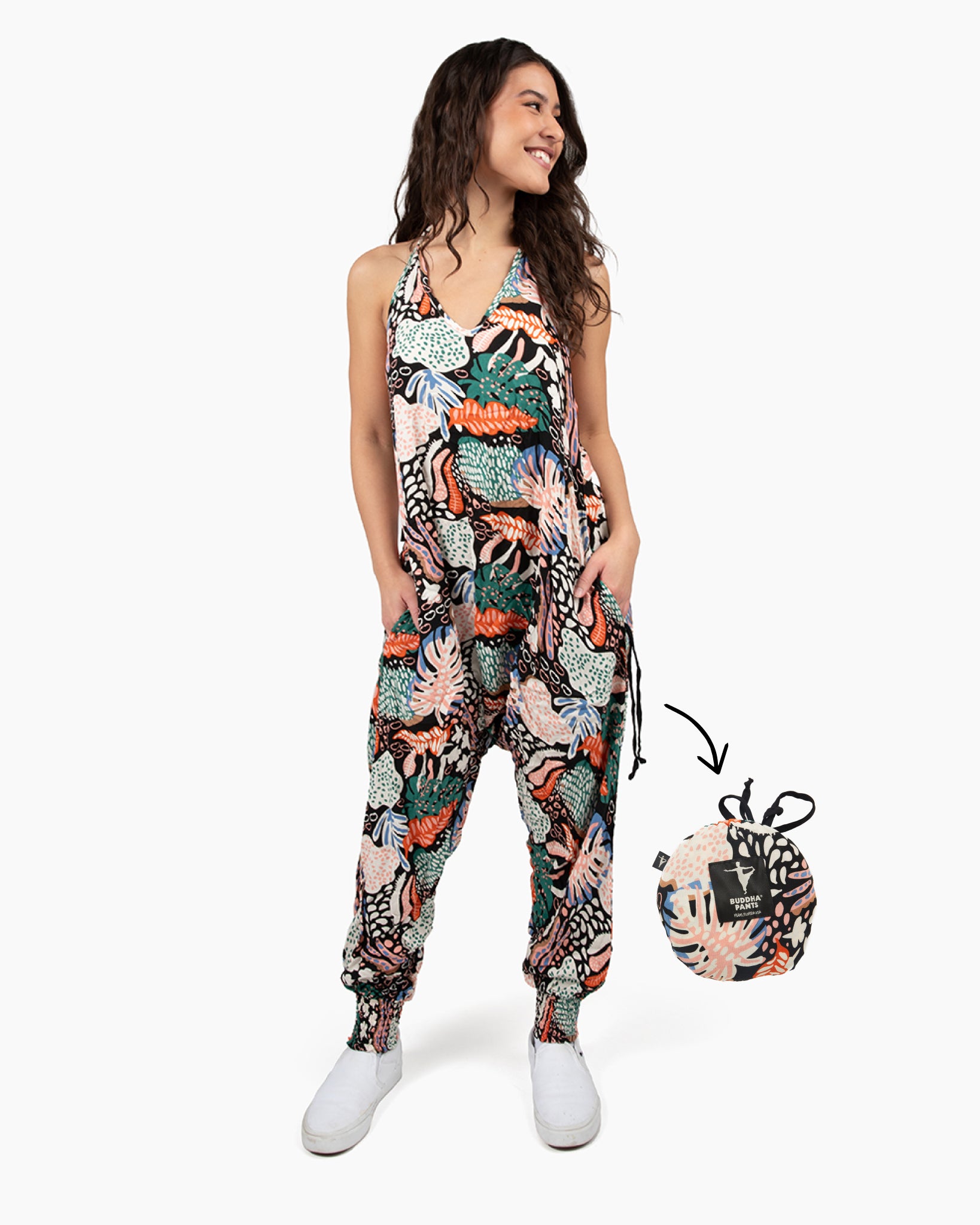 Casual street look featuring digital rainbow jumpsuit with sneakers #color_lionfish