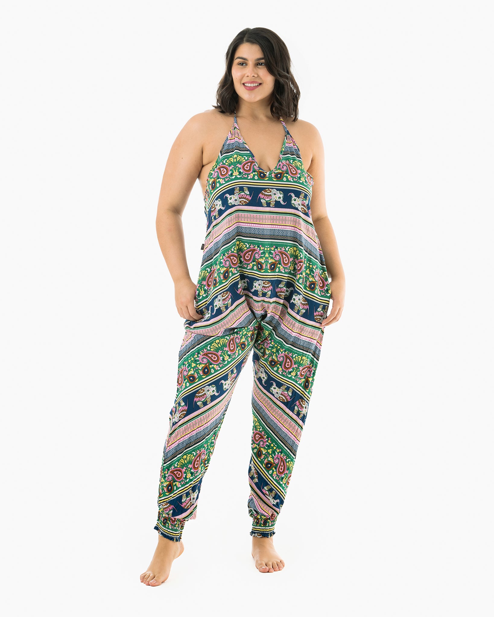 Front view of woman in pink elephant print Savannah Flair jumpsuit #color_pink elephant