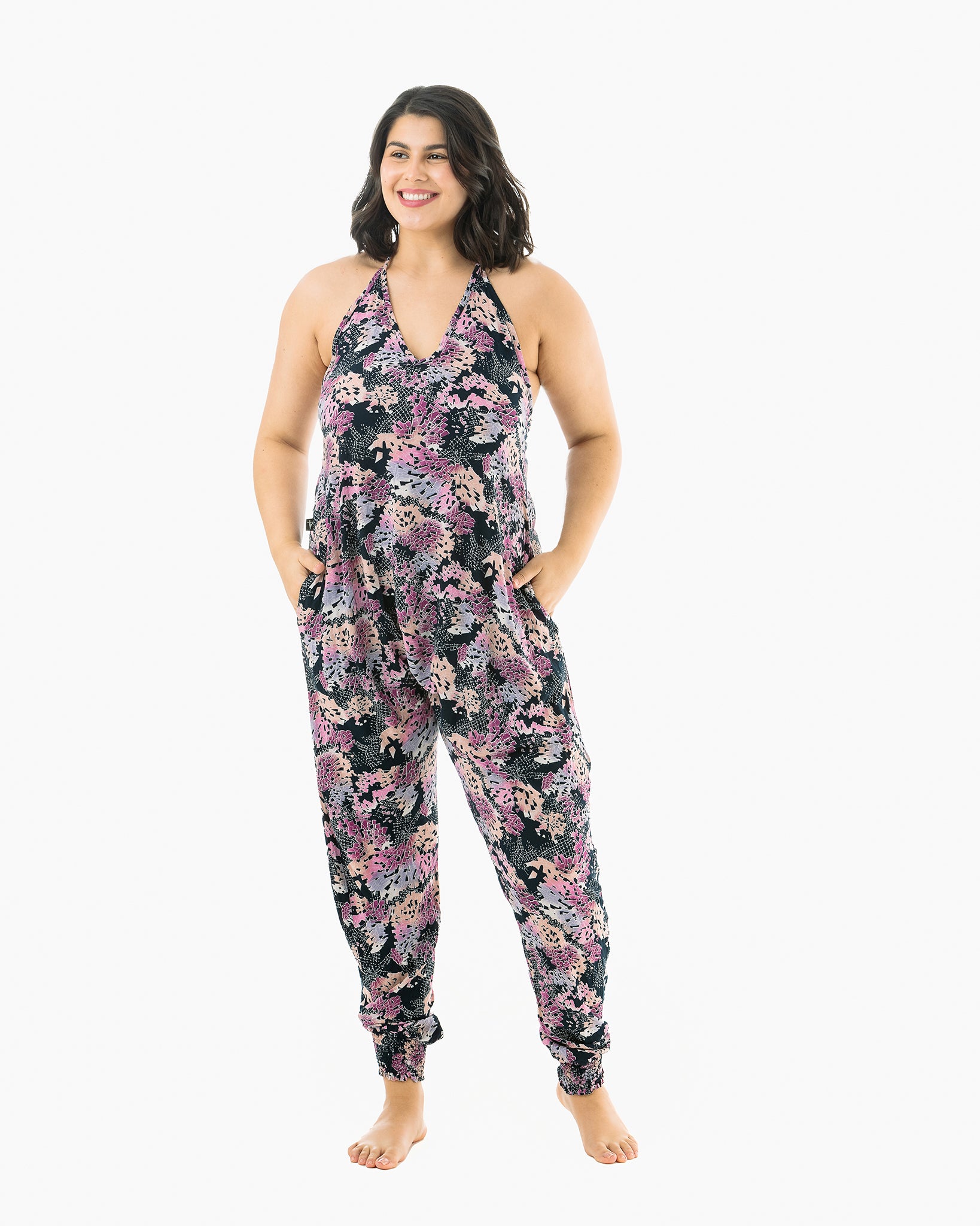 Fashion model in vibrant rainbow jumpsuit #color_digital rainbow