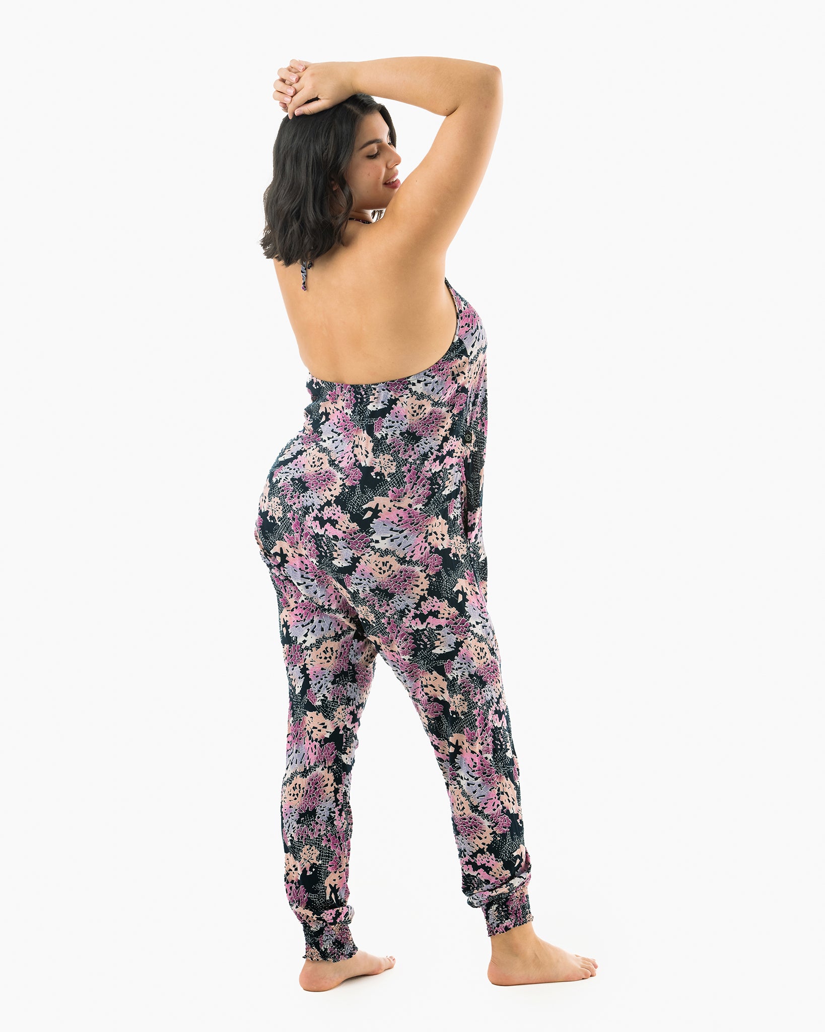 Side pose of woman in digital rainbow jumpsuit
#color_digital rainbow