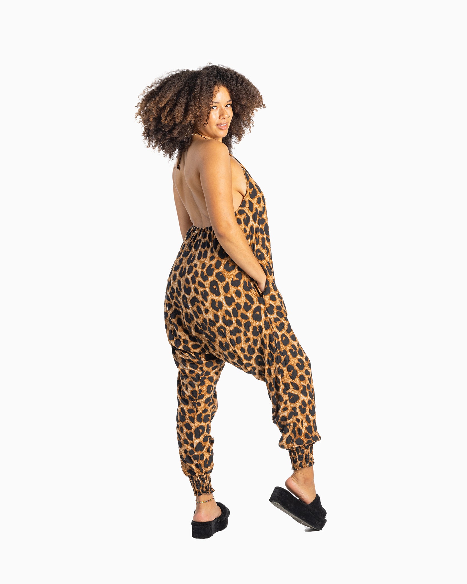 Side view of leopard print one-piece jumpsuit #color_leopard
