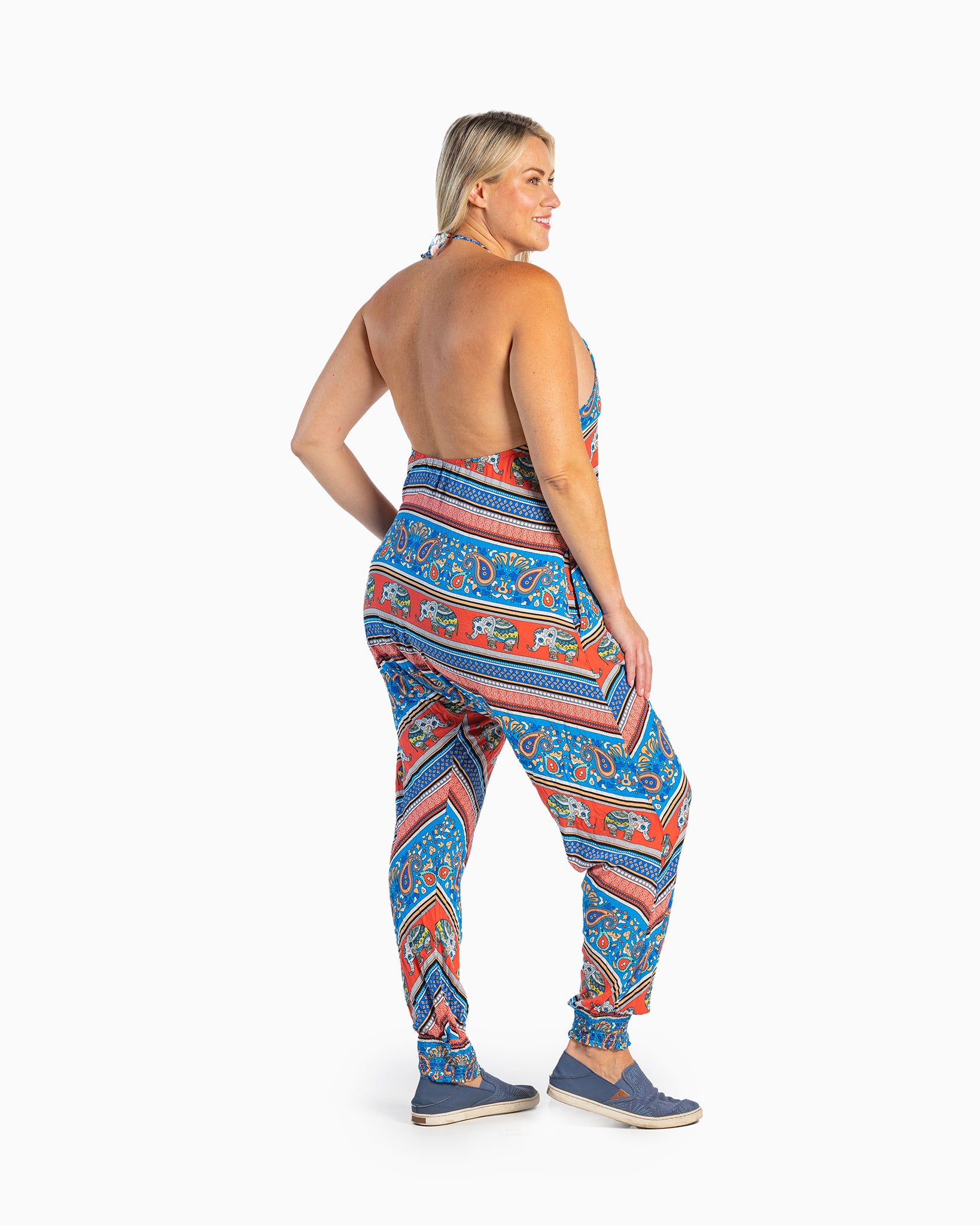 Back view of Savannah harem jumpsuit #color_red elephant