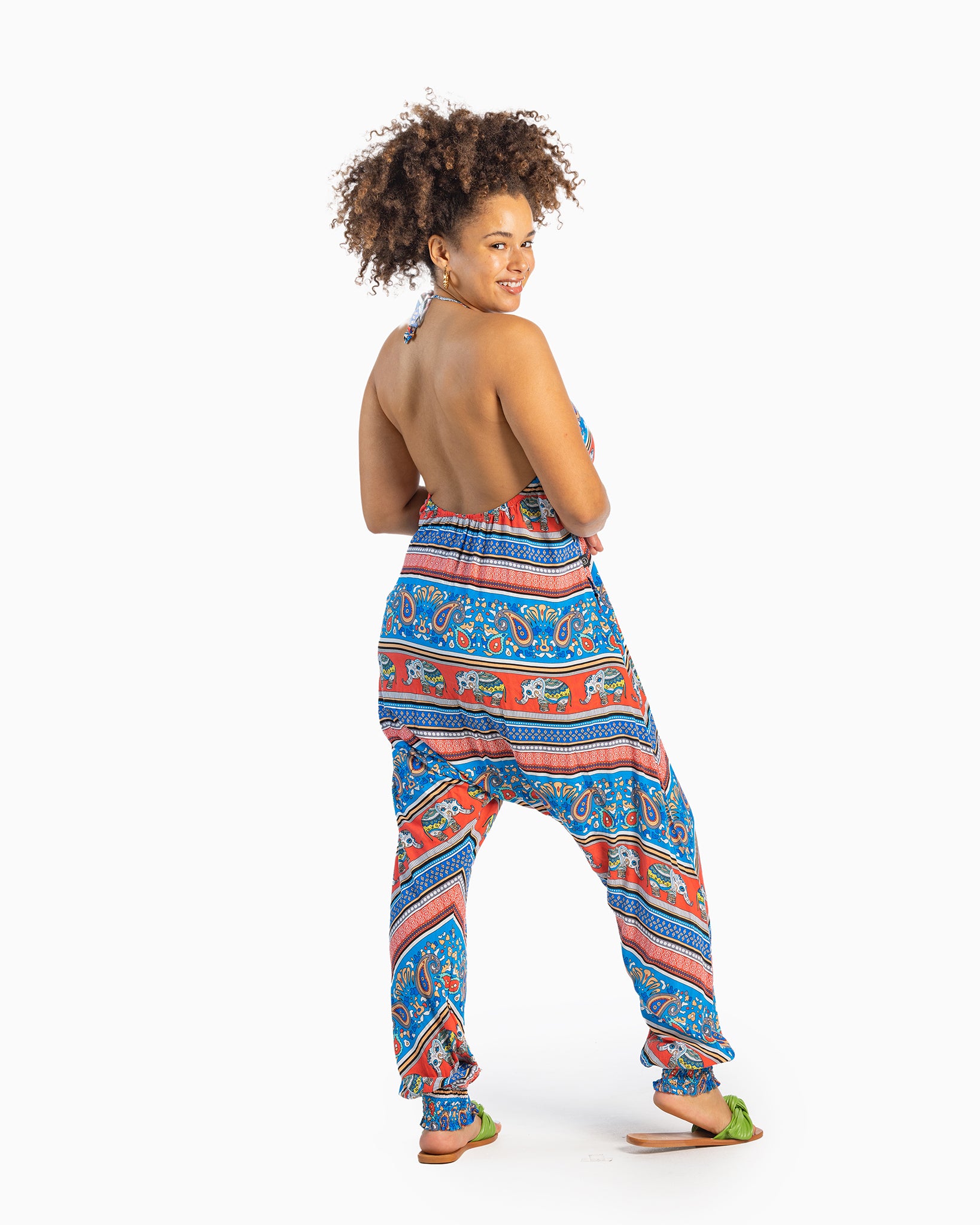 Back of open halter jumper with elephant pattern, shown on model #color_red elephant