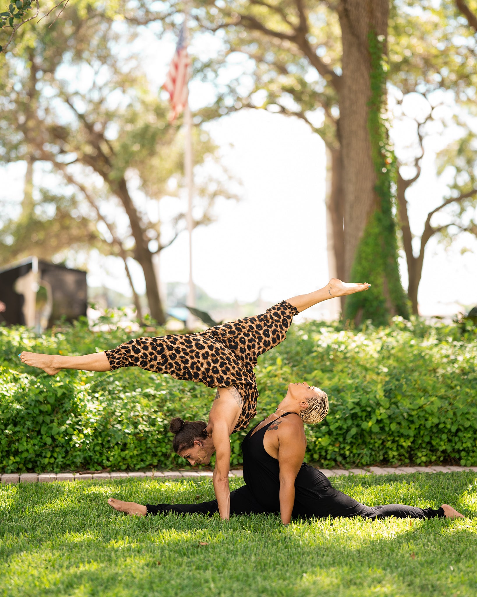 acro yoga in comfy leopard jumpsuit #color_leopard