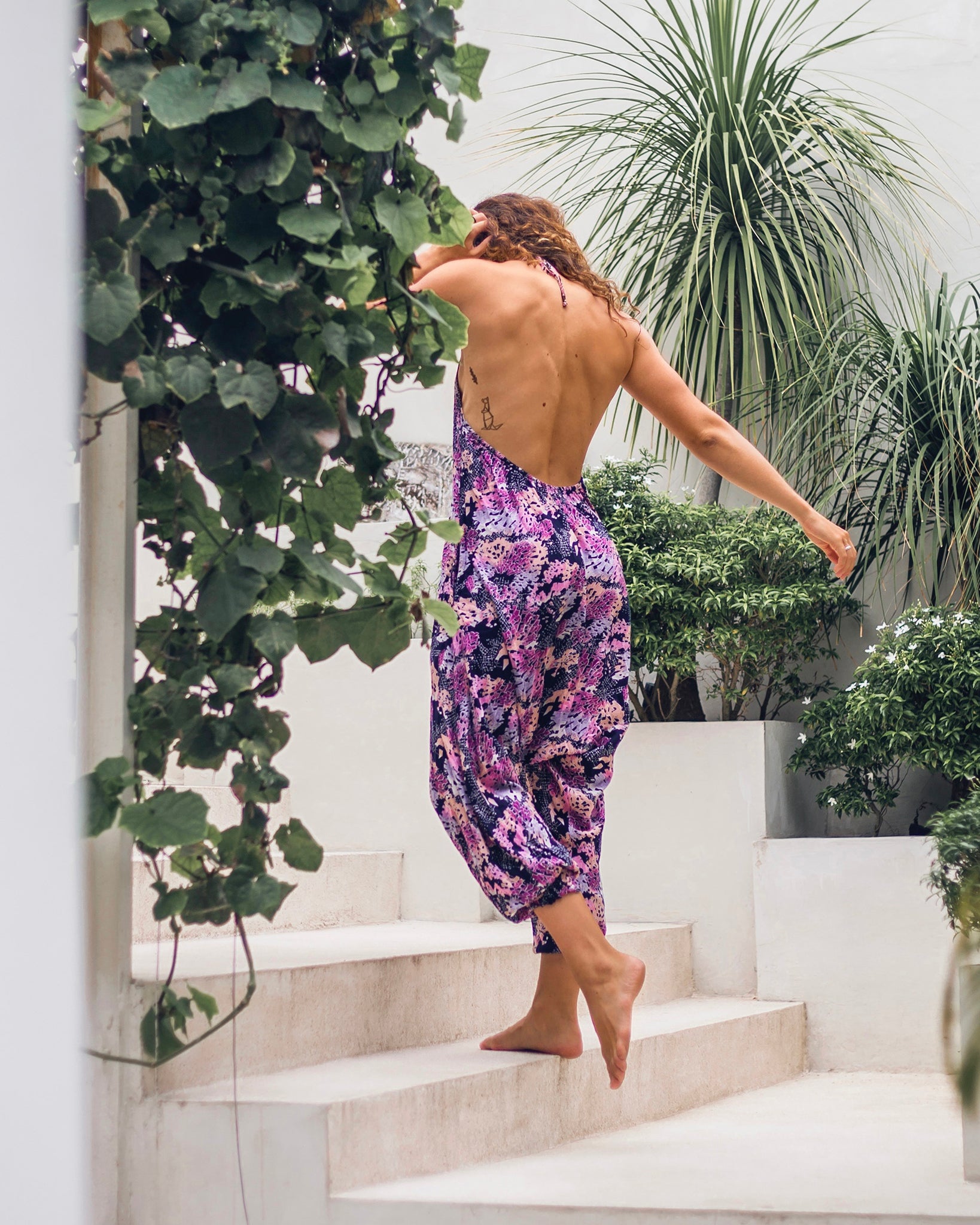 Model walking in multicolor digital print jumpsuit
#color_digital rainbow