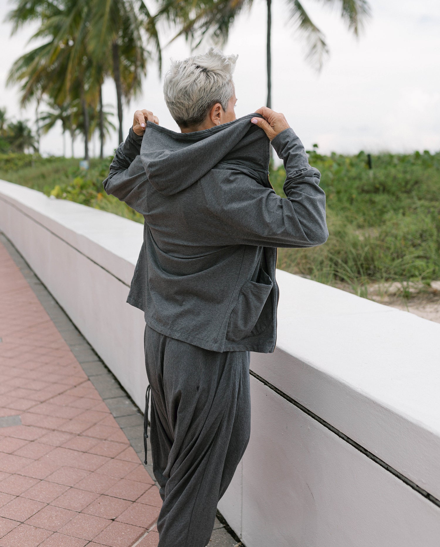 Activewear look: woman in yoga pants and sport hoodie #color_grey