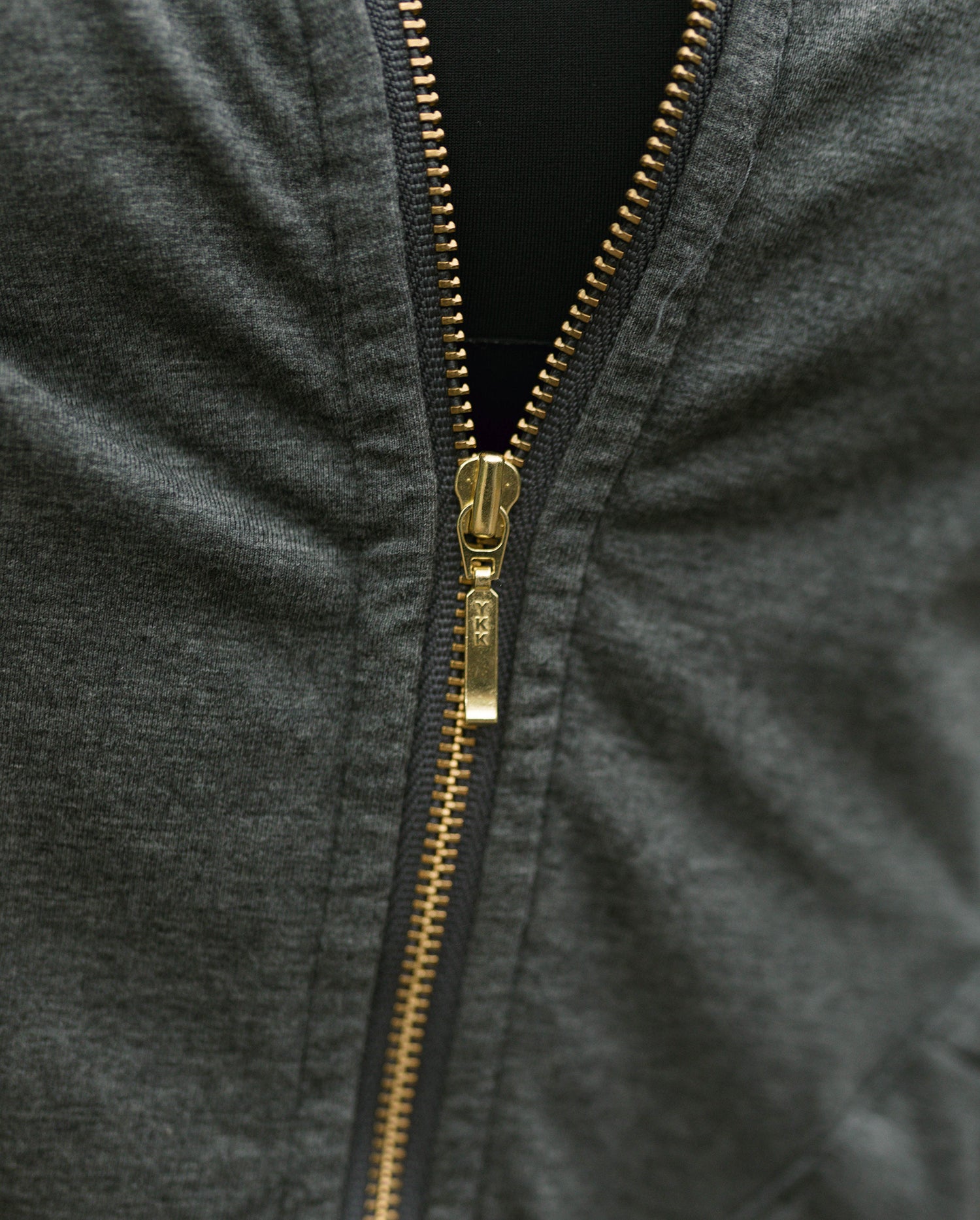 Casual streetwear: woman wearing parachute pants and hoodie #color_grey