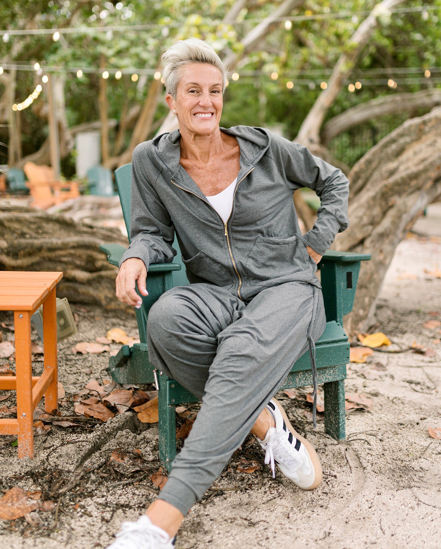 Oversized sport hoodie styled with parachute yoga pants #color_grey